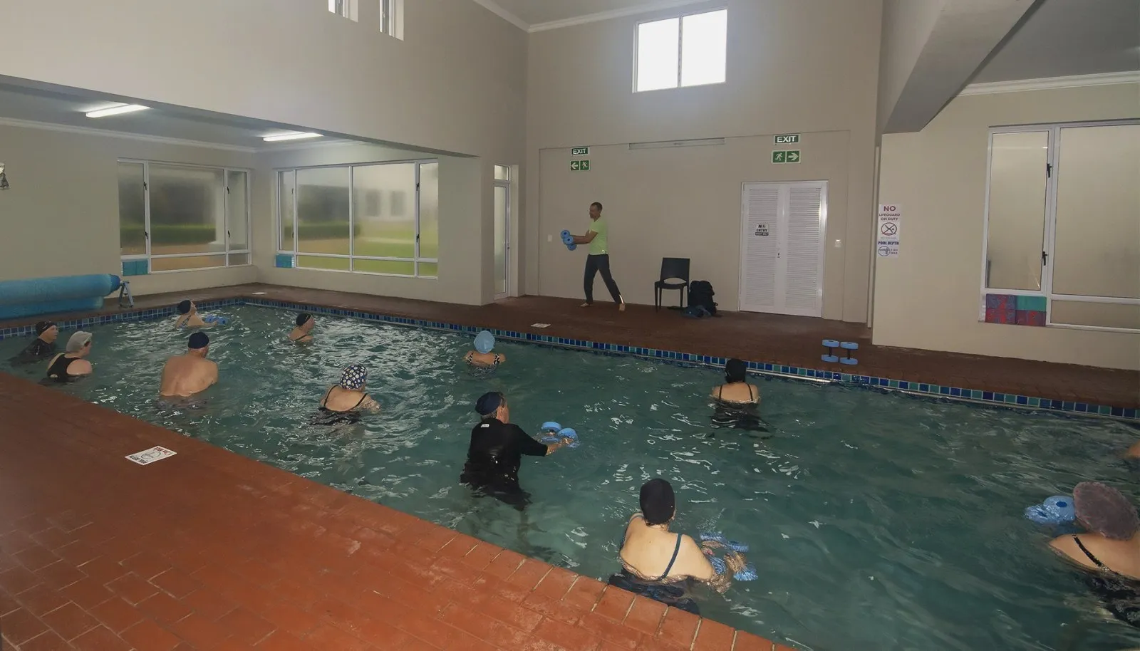 An aqua aerobics class in the heated pool
