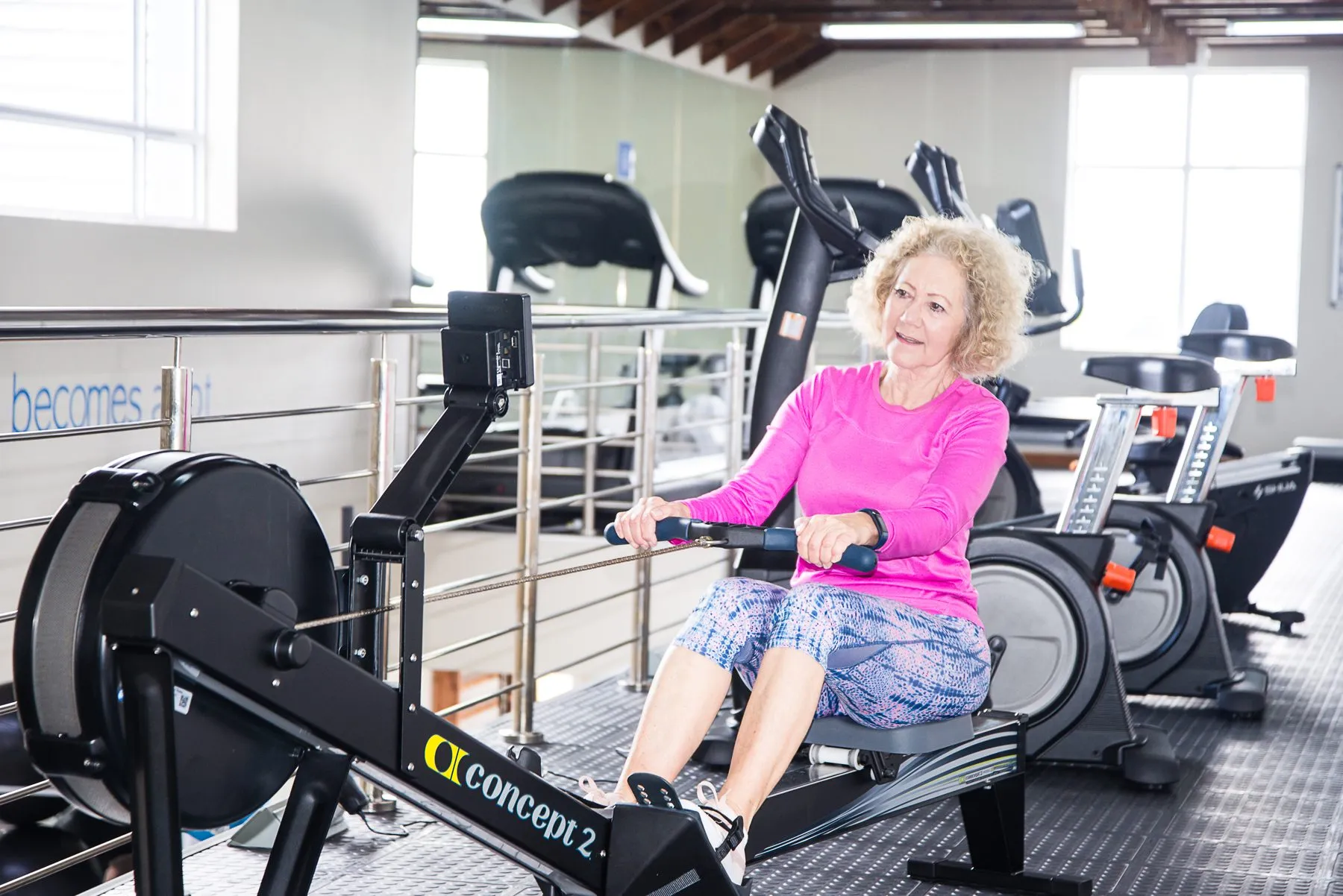 Member on the rowing machine